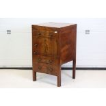 George III Mahogany and String Inlaid enclosed Washstand, the double hinged lid opening to a