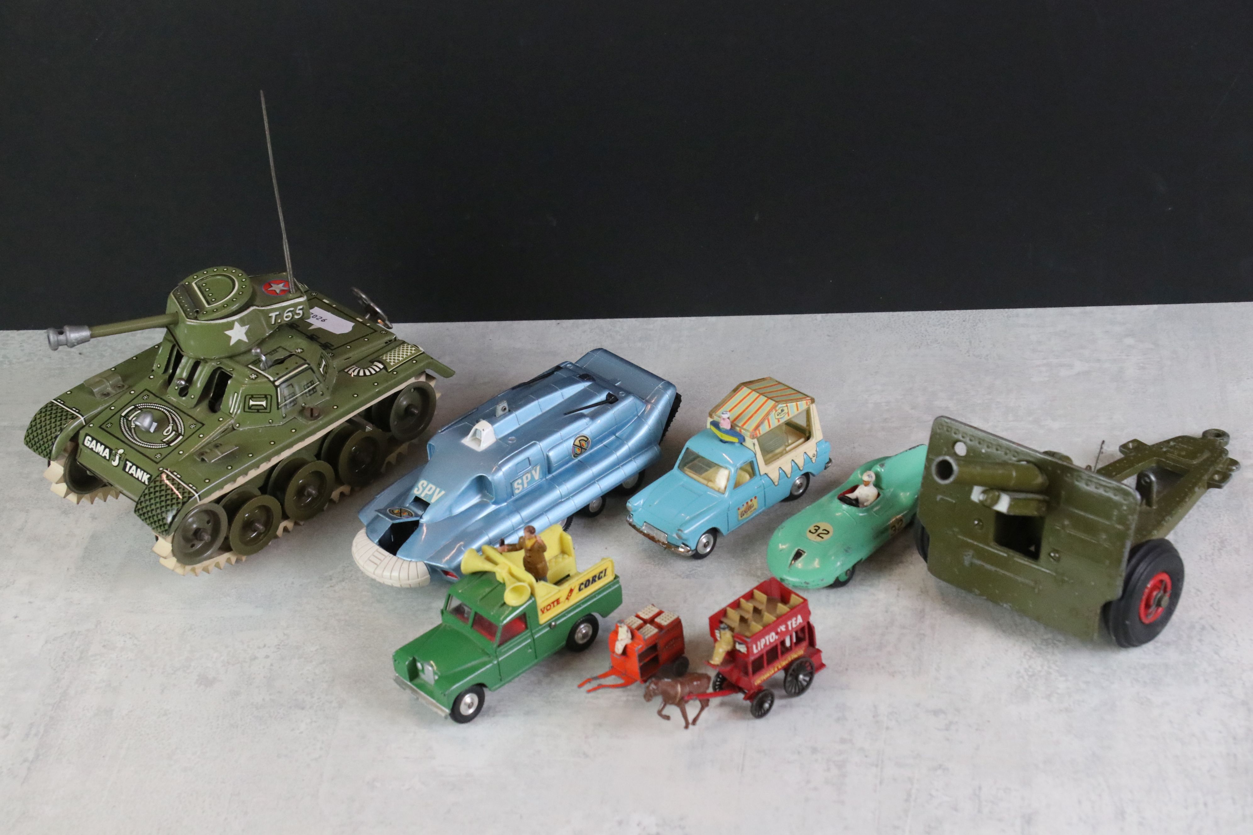 A small collection of vintage die cast and tin plate model vehicles to include Dinky & Corgi