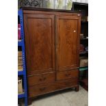 George III Mahogany Wardrobe, modified to one hanging space with faux drawers below, raised on