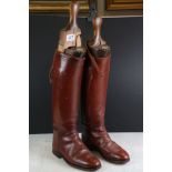 Pair of Early to Mid 20th century Brown Leather Riding Boots with Wooden Trees by Maxwell of London,