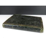 19th century embossed leather album, the spine stamped ' De La Rue & Co. London ' lacking