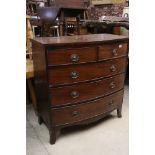 George III Mahogany Bow Front Chest of Two Short over Three Long Drawers, raised on swept bracket