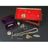 A small quantity of jewellery to include a Victorian bar brooch, silver fancy link Albert chain,