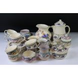 Large collection of Honiton ware ceramics with polychrome decoration, over 50 pieces, to include six