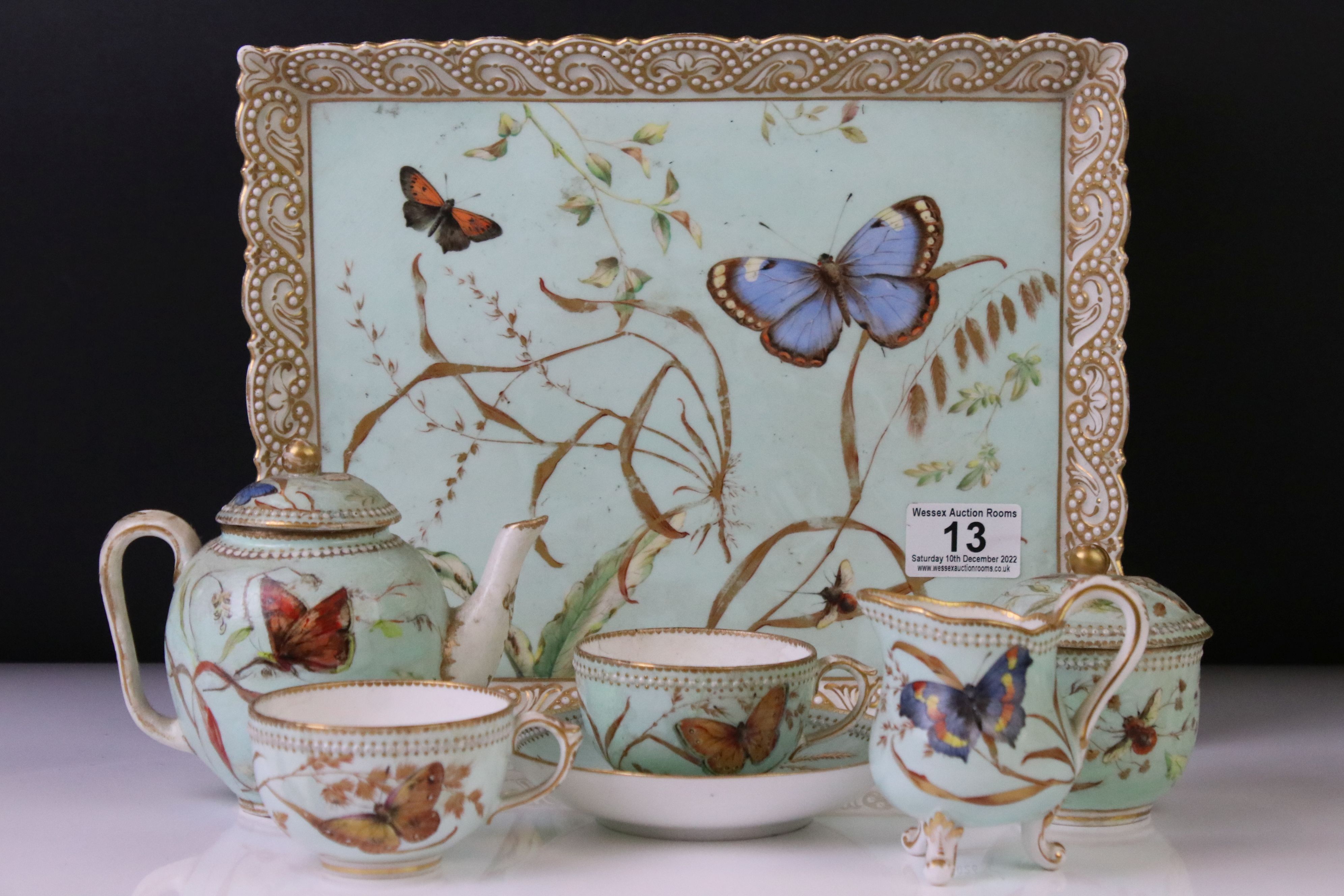 Royal Worcester porcelain cabaret tea set with hand painted butterfly, floral and foliate