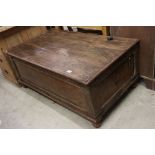 Indian Hardwood and Iron Bound Box Coffee Table, the panelled sides with carved frieze (one end with