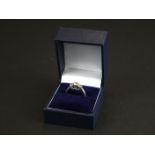 White gold three stone diamond ring of 1ct total weight