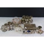 A small collection of silver plate to include cigarette box, cruet sets, egg cups....etc.