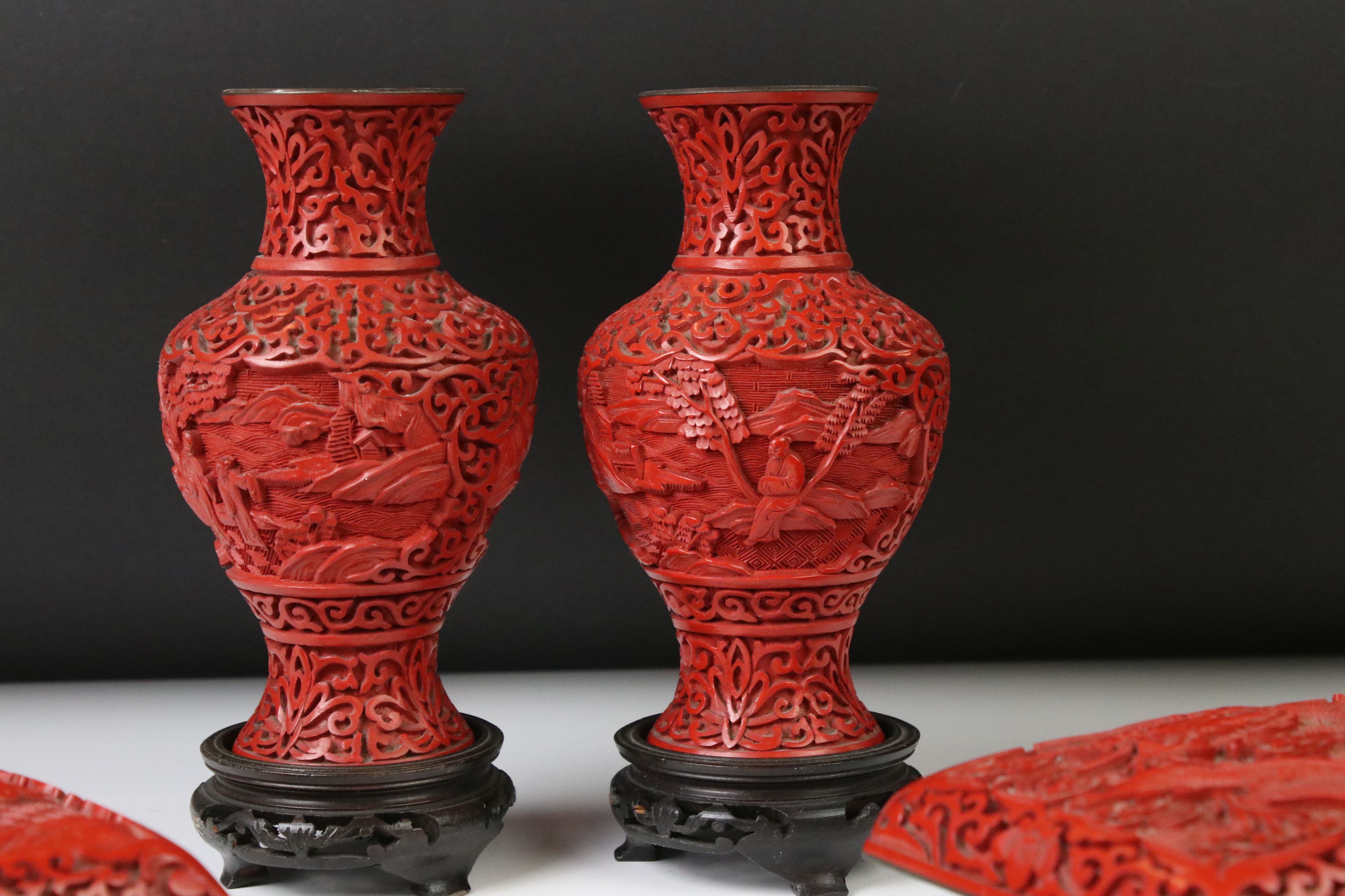 Five pieces of 20th century Chinese cinnabar lacquer ware comprising a pair of baluster vases - Image 6 of 7