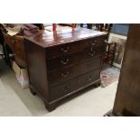 George III Mahogany Chest, the moulded top above four long graduated drawers, raised on bracket