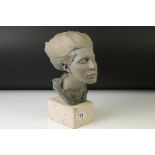 Patinated bust of a woman with her eyes closed, signed Philip Wakeham and dated '94, on a polished