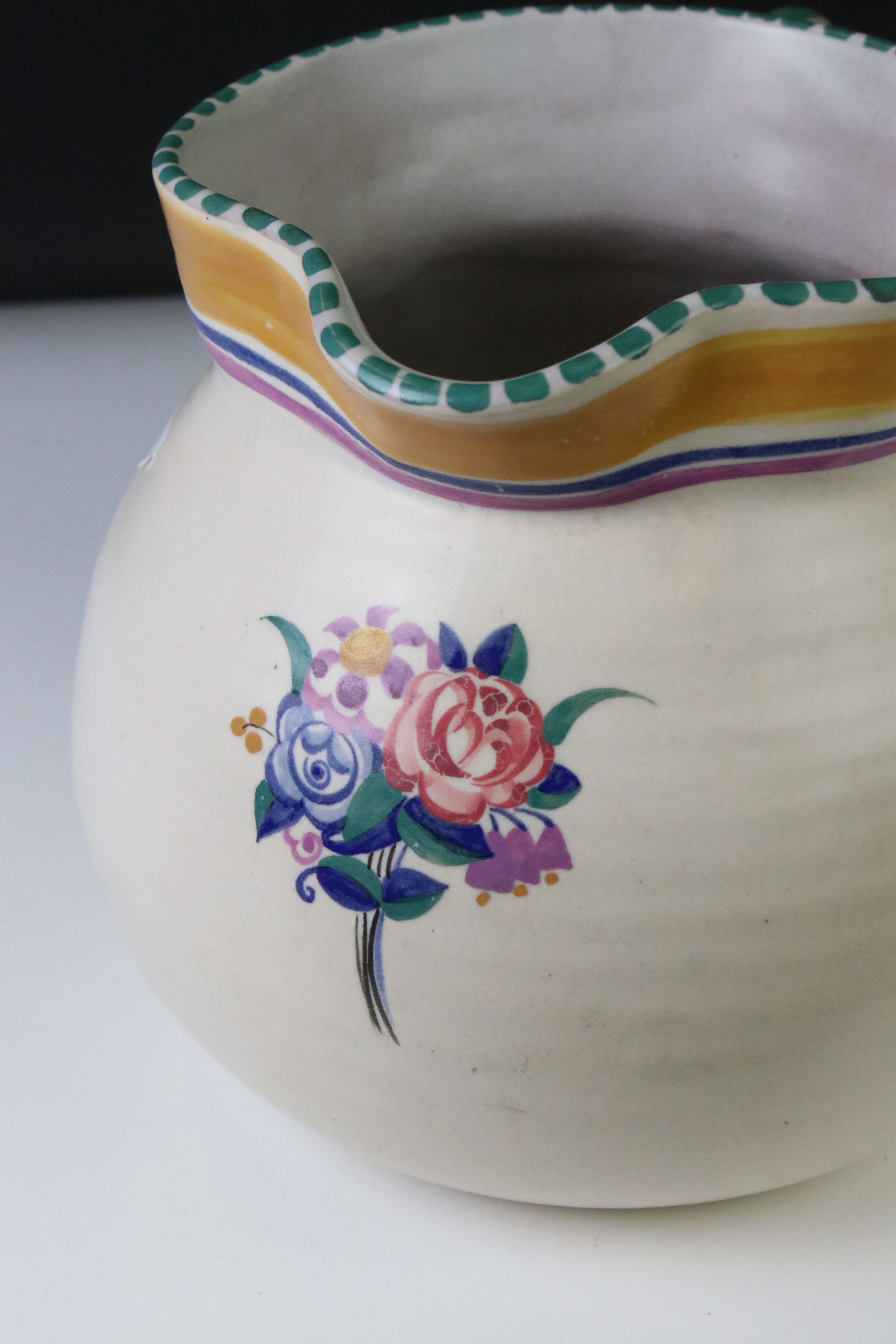 Poole Pottery Carter Stabler Adams Ltd jug with polychrome floral motifs and banding to the upper - Image 4 of 6