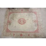 Cream ground Rug with pink stylised decoration, 284cm x 221cm