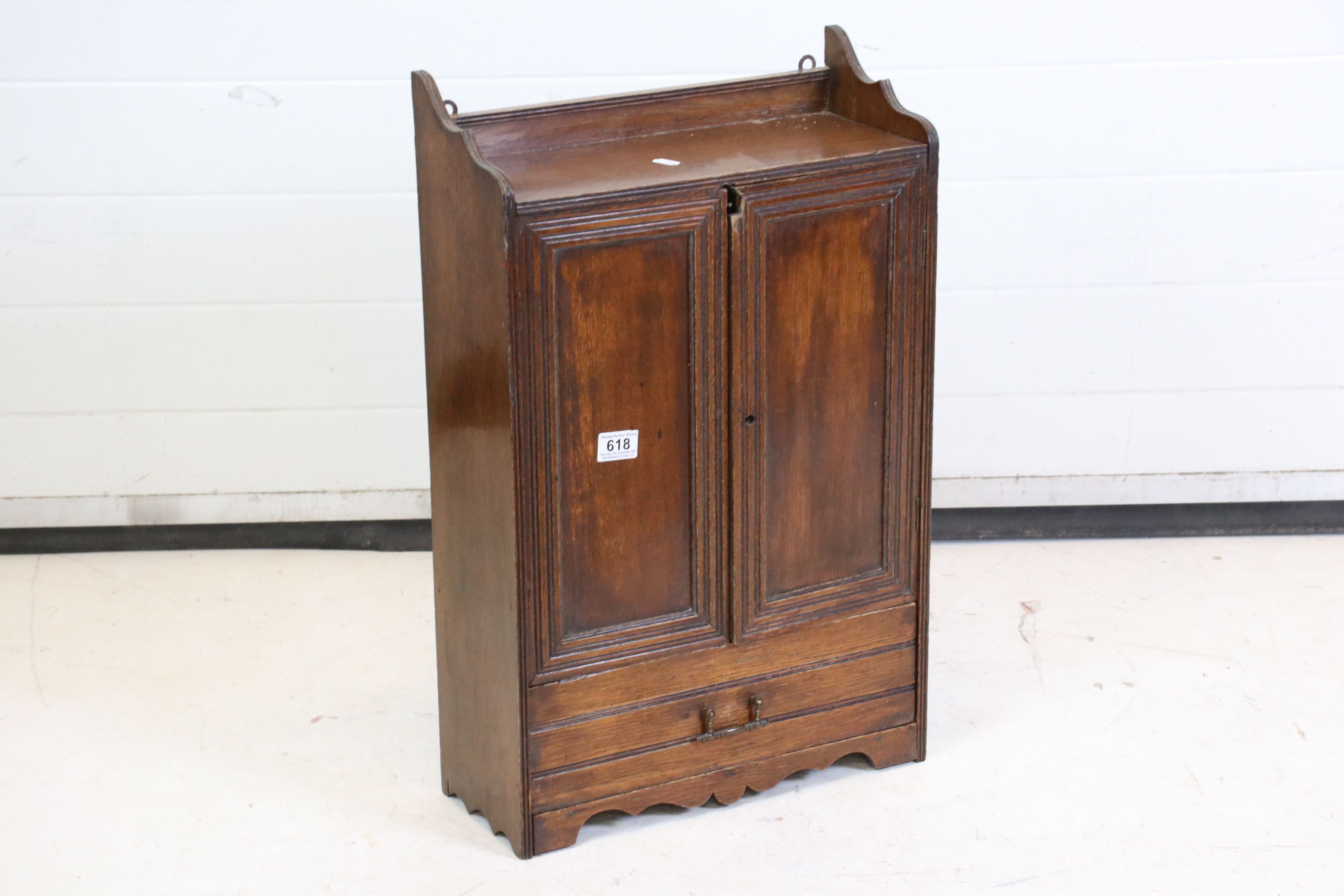 Late 19th / Early 20th century Oak Smoker Cabinet, the two doors opening to a fitted interior,