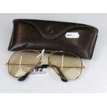 A pair of traditional Ray-Ban aviator sunglasses complete with case.