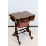 Victorian Burr Walnut Games and Sewing Table, the hinged fold-over swivel top opening to an inlaid