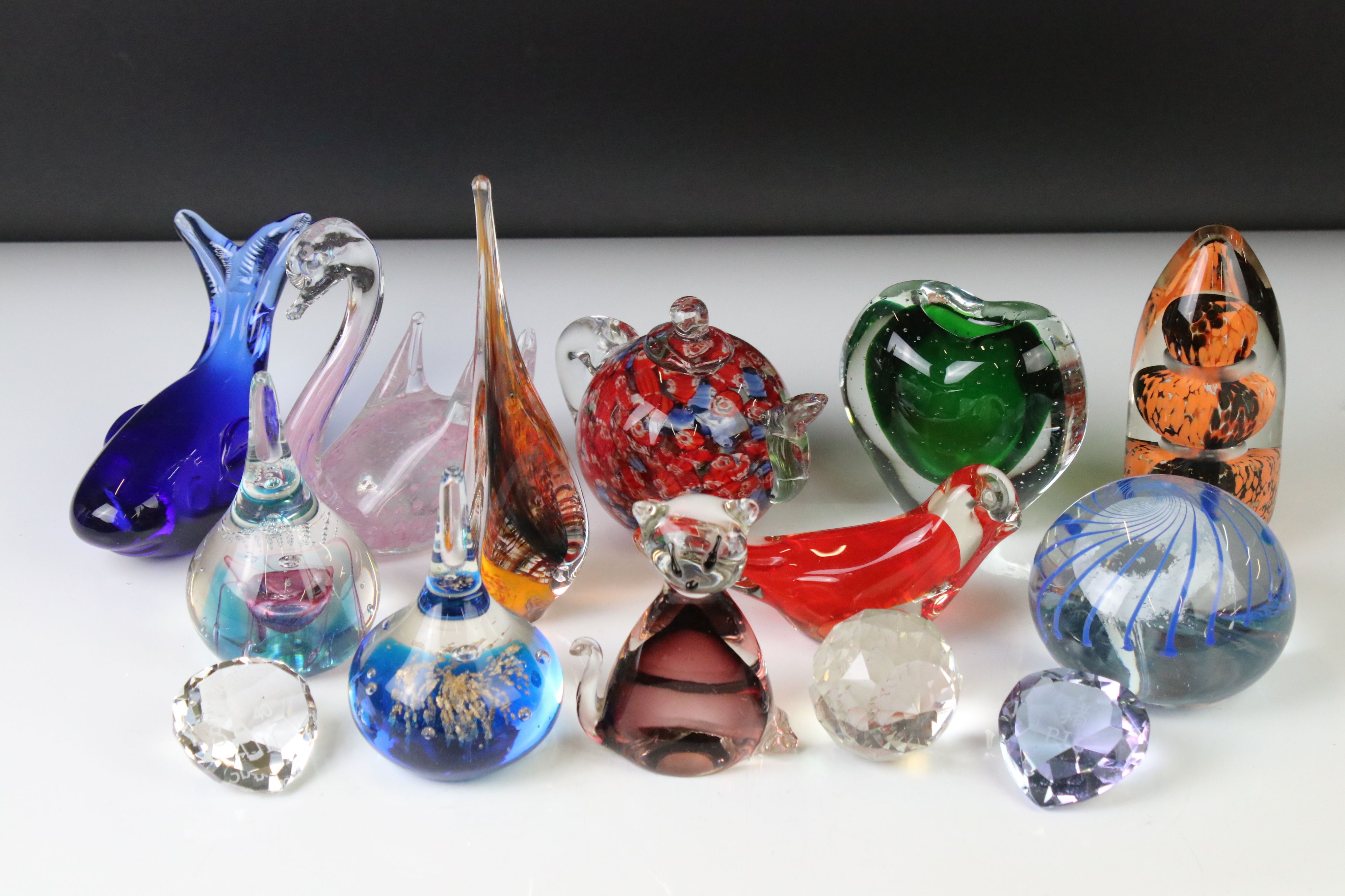 Collection of glass paperweights, to include animals, tea pot etc