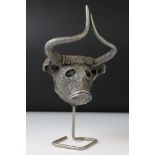 Aluminium bull's head sculpture mounted on a metal stand, a copy of a sculpture in the Bahrain
