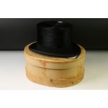 Gieves of London black silk top hat in original hat box. Internal headband measurements: approx 55cm