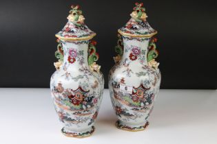 Pair of Mason's Ironstone vases and covers with ' Chinese Landscape ' of octagonal baluster shape,
