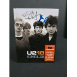 Music Autograph - U2 18 Singles Box Set signed to the cover by 3 of the band including Bono &