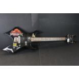 Guitar - B.C. Rich Warlock Bronze Series electric guitar in black. Various band stickers have been