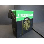 Vinyl - The Beatles Collection 7" box set on Apple / World Records. Box Vg, Sleeves & Vinyl Ex