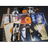 Vinyl - 27 David Bowie singles including foreign pressings. Condition varies
