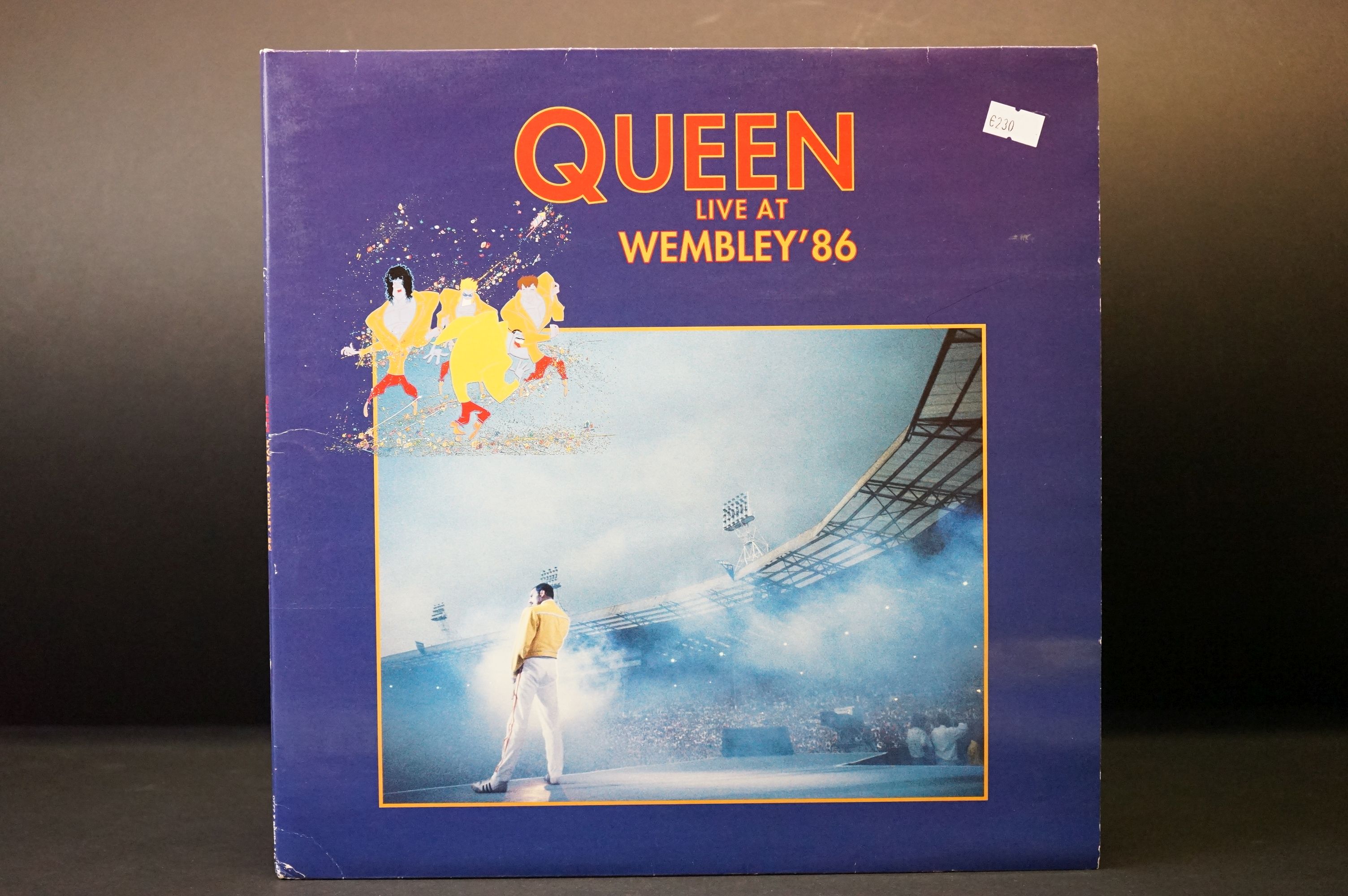 Vinyl - Queen Live At Wembley '86 double LP (Parlophone – PCSP 725). Gatefold sleeve has corner fold