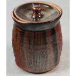 St Ives Pottery tobacco jar, of barrel form with vertical incised decoration, impressed marks to