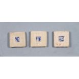 Jessa WATERS (British 20th Century) Three tiles with blue vitreous panels, mounted on a board, 7"