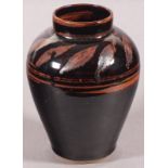 Jacqui CLARK (British 20th/21st Century) Stoneware vase, brown glaze with leaf decoration to the