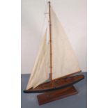 A late 20th Century model pond yacht, of Bermudan rig with a dark blue hull and gilt boot-line, 35.