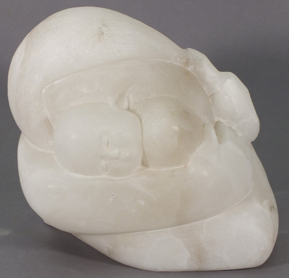 Theresa GILDER (British b. 1935) Motherhood, White alabaster, Signed to rear, 9.5" (24cm) high