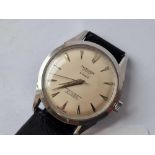 A gents wrist watch by J W Benson "super flat" with seconds sweep