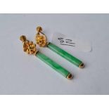 A pair of vintage gold and jade earrings