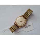 A GENTS GOLD WRIST WATCH 9CT OMEGA GENEVE with second sweep winder missing