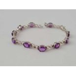 An amethyst and 9ct white gold bracelet (stone missing) 12.5g inc