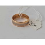 A two colour 18ct gold wedding band approx size R-S 5g