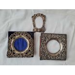 Two photo frames with circular apertures and another with mount only