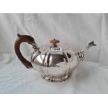 A GEORGIAN TEA POT WITH RIBBED COMPRESSED BODY AND SPREADING FOOT 10 1/2 INCHES WIDE LONDON 1821