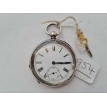 A gents silver pocket watch together with key with seconds dial W/O