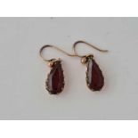 A pair of garnet drop earrings 9ct