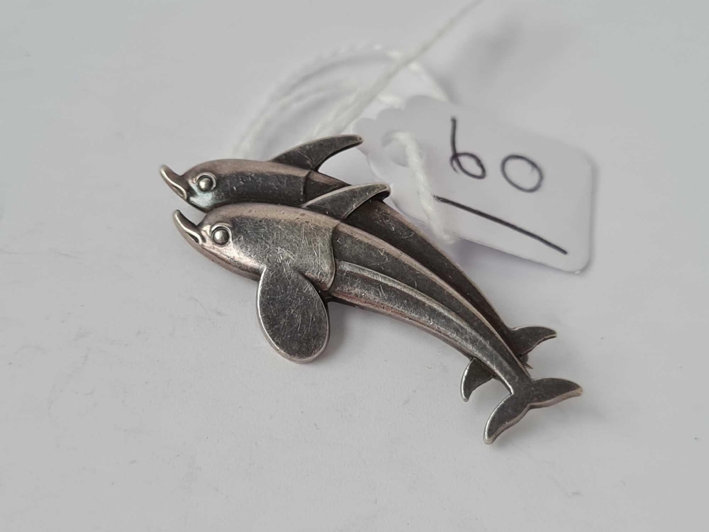 A GEORG JENSEN silver dolphin brooch