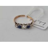 A gold and platinum set white and blue sapphire five stone ring 9ct size R 1/2 - 1.8 gms
