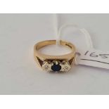 A sapphire and diamond ring 9ct size o 1/2 - 4.1 gms