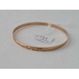 A 9ct solid bangle - 7.4 gms