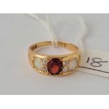 A attractive seven stone opal diamond garnet ring 18ct gold size O - 4.4 gms