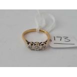 A three stone diamond ring 18ct gold size k 1/2 - 2.3 gms