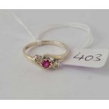 A diamond and ruby 9ct white gold ring size Q 2.5g inc